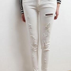 White Cutout Ripped Shreddered White Skinny Pants..
