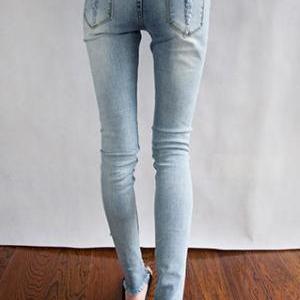 Metal Rivets Ripped Light Blue Cropped Skinny..